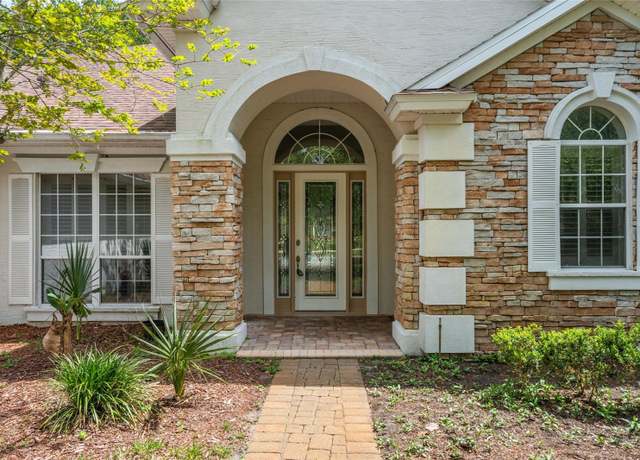 Property at 8 N Village Dr, Palm Coast, FL 32137, 4 beds, 3 baths