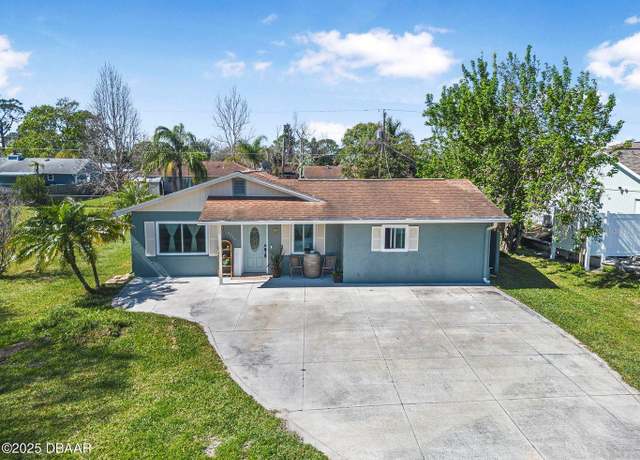 Property at 2216 Umbrella Tree Dr, Edgewater, FL 32141, 4 beds, 2 baths
