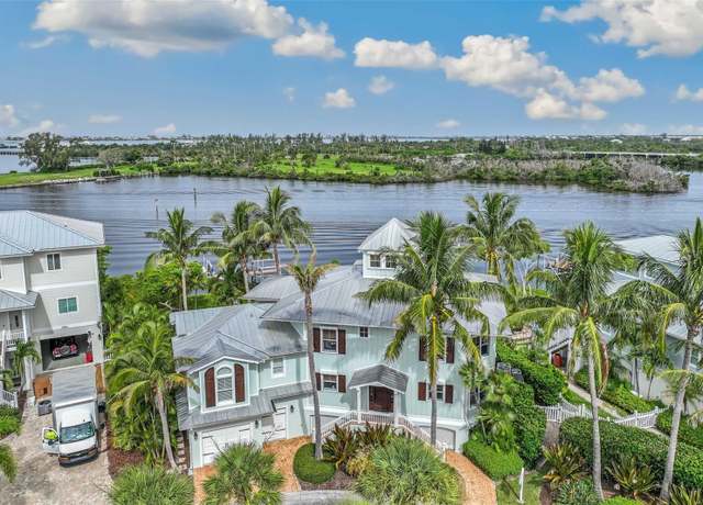 Property at 13310 Anglers Way, Placida, FL 33946, 4 beds, 4.5 baths