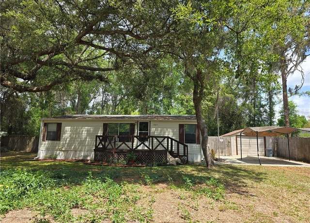 Property at 8009 E Peacock Ln, Floral City, FL 34436, 4 beds, 3 baths