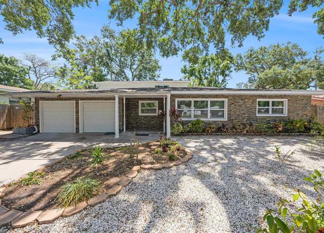 Property at 1557 Robinson Dr N, St Petersburg, FL 33710, 4 beds, 4.5 baths