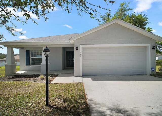 Property at 328 Woodland Trl, Lady Lake, FL 32159, 4 beds, 2 baths