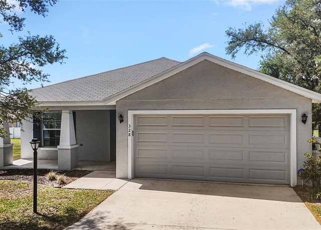 Property at 328 Woodland Trl, Lady Lake, FL 32159, 4 beds, 2 baths