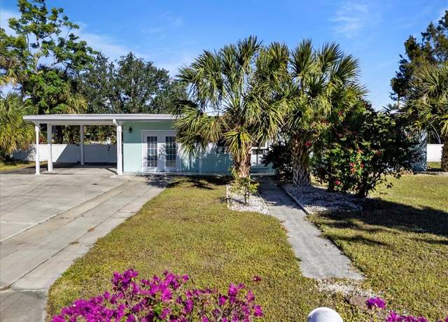 Property at 207 Waterway Cir NE, Port Charlotte, FL 33952, 3 beds, 2 baths