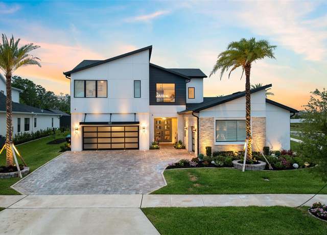 Property at 9877 Laurel Berry Dr, Orlando, FL 32827, 4 beds, 4.5 baths