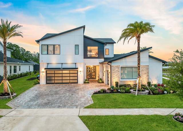Property at 9877 Laurel Berry Dr, Orlando, FL 32827, 4 beds, 4.5 baths