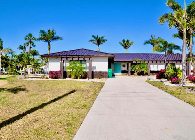 Property at 148 Peckham St SE, Port Charlotte, FL 33952, 4 beds, 3 baths