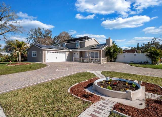 Property at 15701 Springmoss Ln, Tampa, FL 33624, 4 beds, 4 baths