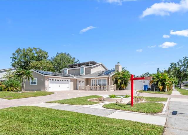 Property at 15701 Springmoss Ln, Tampa, FL 33624, 4 beds, 4 baths