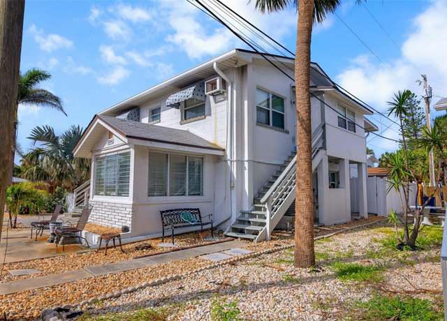 Property at 7304 Coquina Way, St Pete Beach, FL 33706, 5 beds, 4 baths