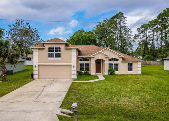Property at 33 Bennett Ln, Palm Coast, FL 32137, 4 beds, 3 baths