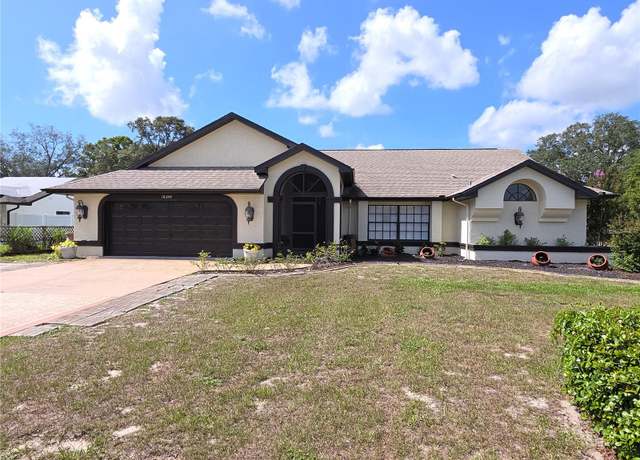 Property at 10244 Hoover St, Spring Hill, FL 34608, 4 beds, 2 baths