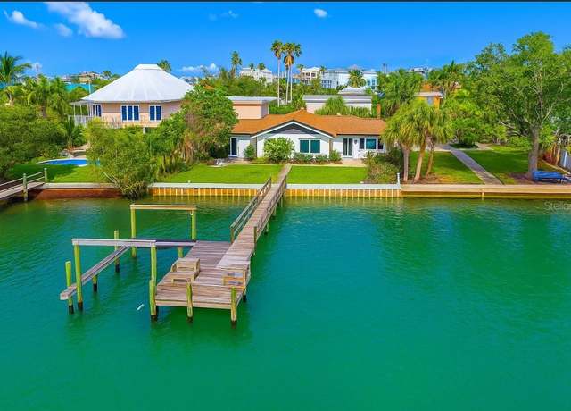 Property at 1140 Boca Ciega Isle Dr, St Pete Beach, FL 33706, 4 beds, 3 baths