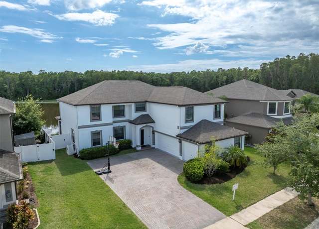 Property at 12135 Crestridge Loop, Trinity, FL 34655, 5 beds, 4 baths