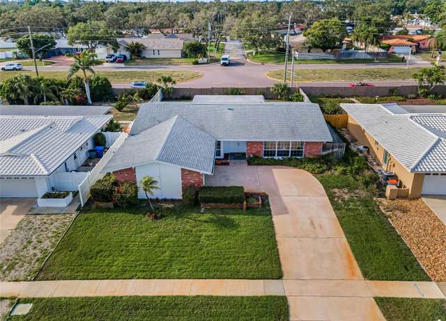 Property at 14341 Passage Way, Seminole, FL 33776, 4 beds, 3 baths