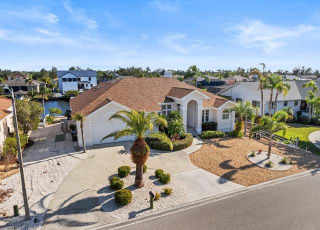 Property at 818 Golf Island Dr, Apollo Beach, FL 33572, 4 beds, 3 baths