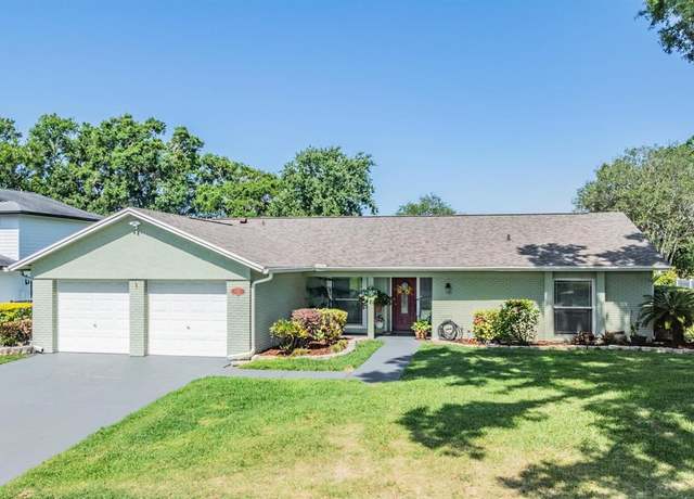Property at 16214 W Course Dr, Tampa, FL 33624, 4 beds, 2 baths