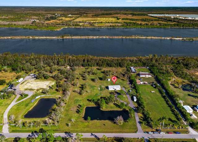 Property at 40450 Little Farm Rd, Punta Gorda, FL 33982, 4 beds, 2 baths