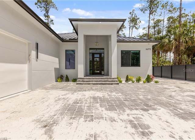 Property at 4693 13th Ave SW, Naples, FL 34116, 4 beds, 3 baths