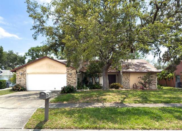 Property at 1228 Rainbrook Cir, Valrico, FL 33596, 3 beds, 2 baths