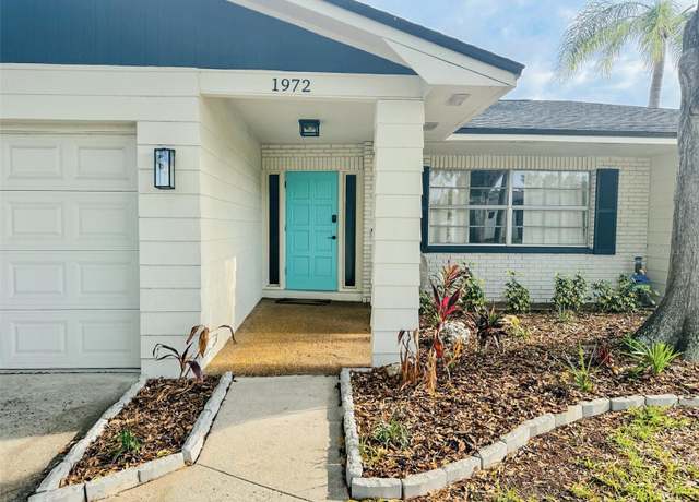 Property at 1972 Briarwood St, Dunedin, FL 34698, 4 beds, 3 baths