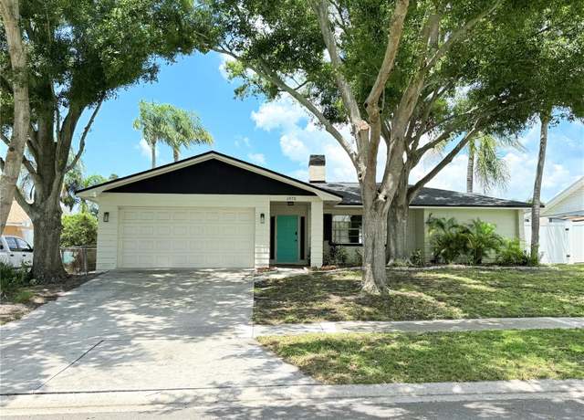 Property at 1972 Briarwood St, Dunedin, FL 34698, 4 beds, 3 baths