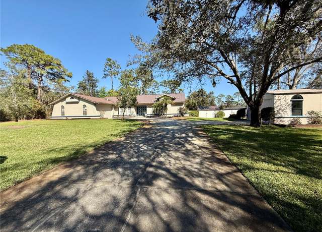 Property at 7090 Red Oak Loop, New Port Richey, FL 34654, 4 beds, 2 baths