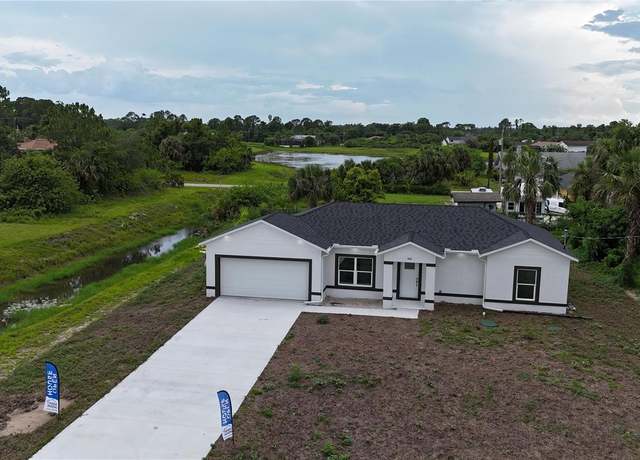 Property at 842 Sentinela Blvd, Lehigh Acres, FL 33974, 3 beds, 2 baths