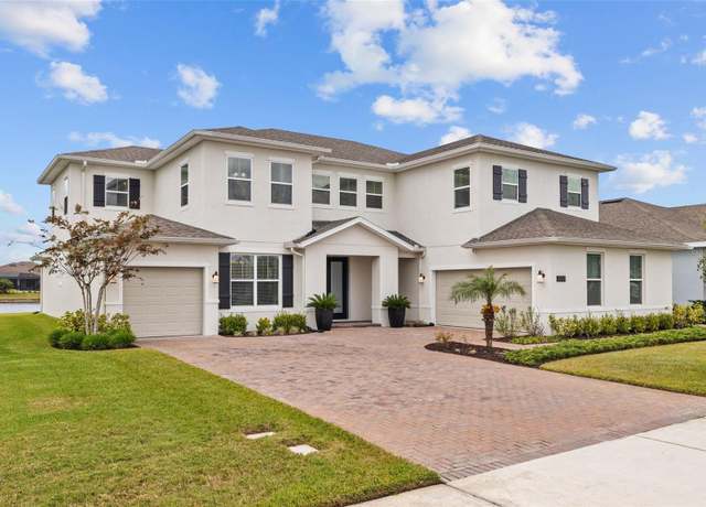 Property at 7721 Roma Dune Dr, Wesley Chapel, FL 33545, 5 beds, 4.5 baths