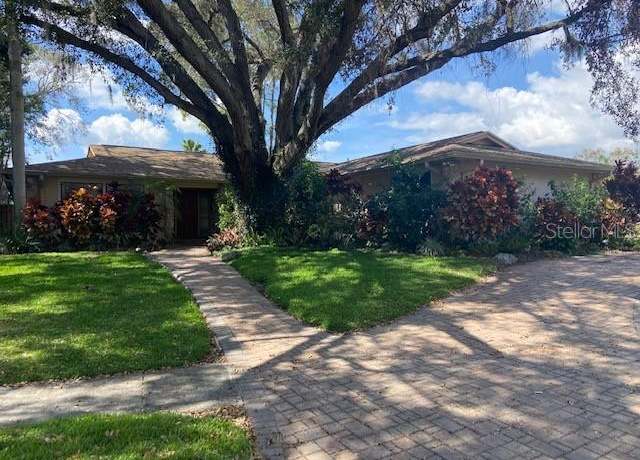 Property at 13304 Meadowwood Ct, Tampa, FL 33618, 4 beds, 2.5 baths
