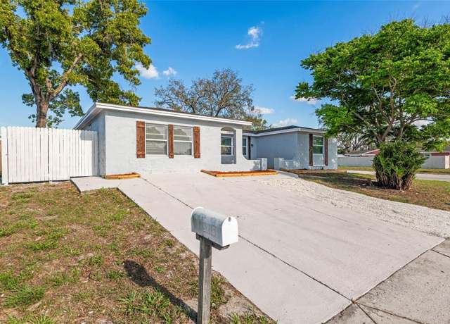 Property at 9216 Mark Twain Ln, Port Richey, FL 34668, 4 beds, 2 baths
