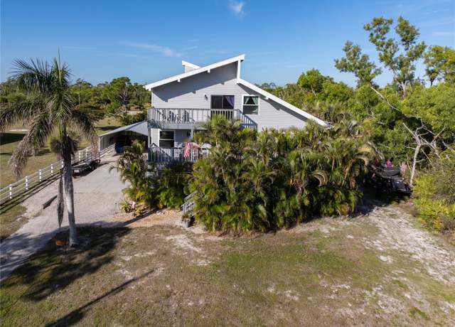 Property at 11891 Tawas Ct, Bokeelia, FL 33922, 3 beds, 2 baths