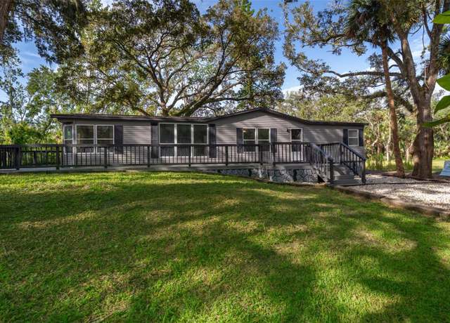 Property at 411 Racoon Trl, Geneva, FL 32732, 3 beds, 2 baths