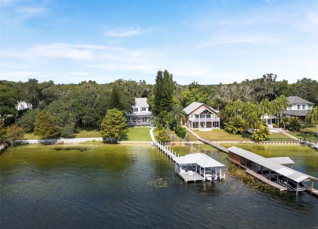 Property at 12428 Summerport Ln, Windermere, FL 34786, 4 beds, 4.5 baths