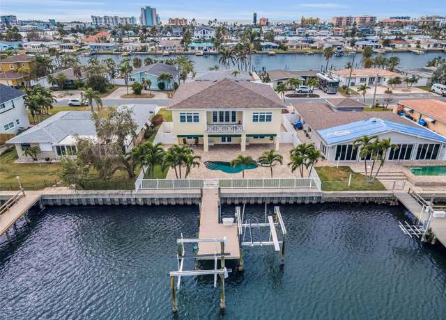 Property at 11325 5th St E, Treasure Island, FL 33706, 3 beds, 3 baths