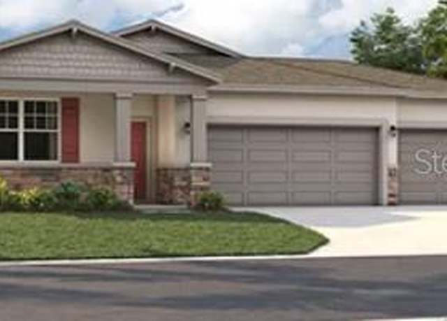 Property at 12922 Trovita Dr, Grand Island, FL 32735, 4 beds, 2 baths