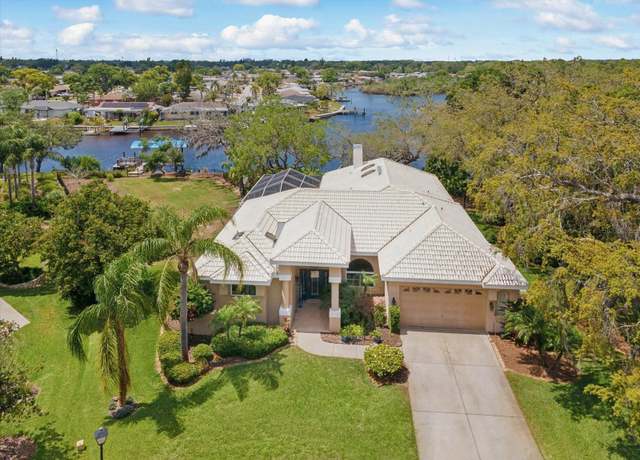 Property at 5903 Cachette DE Riviera Ct, New Port Richey, FL 34655, 4 beds, 3 baths