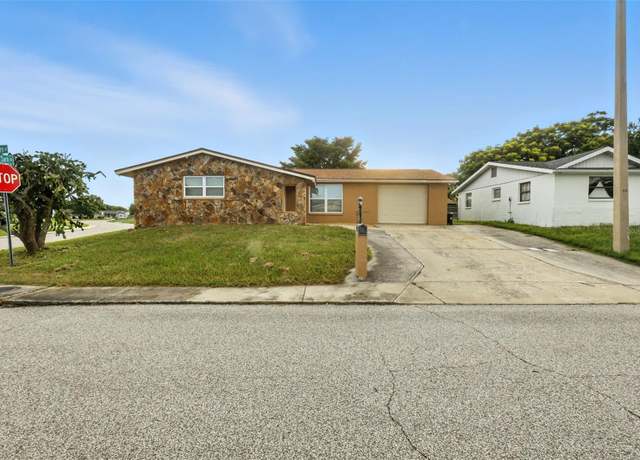 Property at 9239 Palm Ave, Port Richey, FL 34668, 3 beds, 2 baths