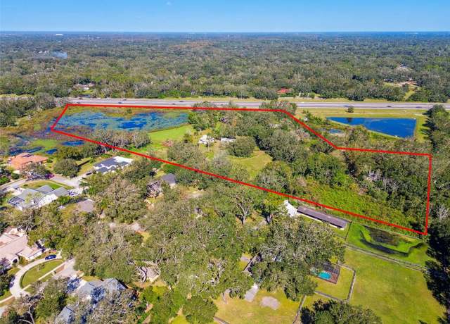 Property at 1810 Curry Rd, Lutz, FL 33549, 3 beds, 3 baths