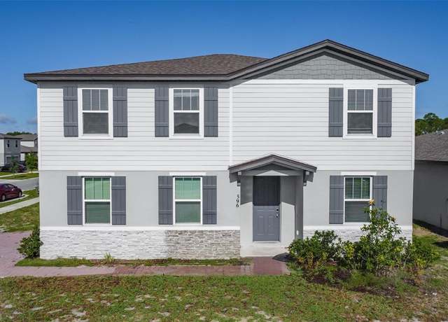 Property at 596 Sun Warbler Way, St Cloud, FL 34771, 4 beds, 2.5 baths