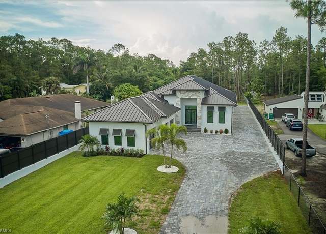 Property at 5847 English Oaks Ln, Naples, FL 34119, 4 beds, 4.5 baths