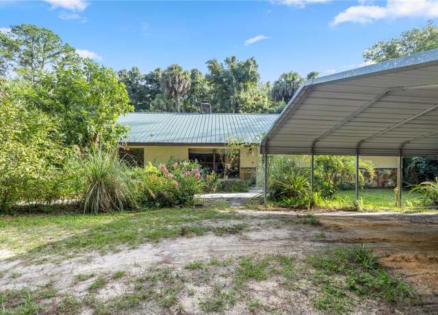 Property at 7679 S Magnolia Ave, Ocala, FL 34476, 5 beds, 4 baths