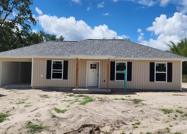 Property at 24128 SW South Lakes Ct, Dunnellon, FL 34431, 3 beds, 2 baths