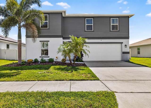 Property at 411 Sunfish Dr, Winter Haven, FL 33881, 4 beds, 2.5 baths