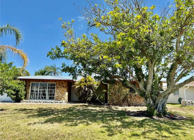 Property at 261 Caddy Rd, Rotonda West, FL 33947, 3 beds, 2 baths