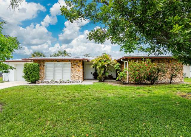 Property at 261 Caddy Rd, Rotonda West, FL 33947, 3 beds, 2 baths
