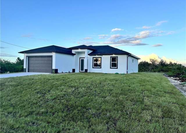 Property at 325 Paulcrest Ave, Lehigh Acres, FL 33974, 4 beds, 2 baths