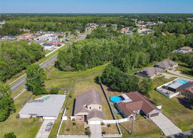 Property at 602 Milan Dr, Kissimmee, FL 34758, 4 beds, 2.5 baths