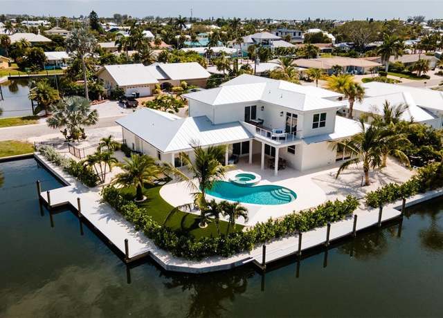 Property at 603 Emerald Ln, Holmes Beach, FL 34217, 5 beds, 5.5 baths