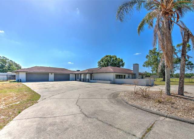 Property at 6709 W Knights Griffin Rd, Plant City, FL 33565, 4 beds, 2 baths